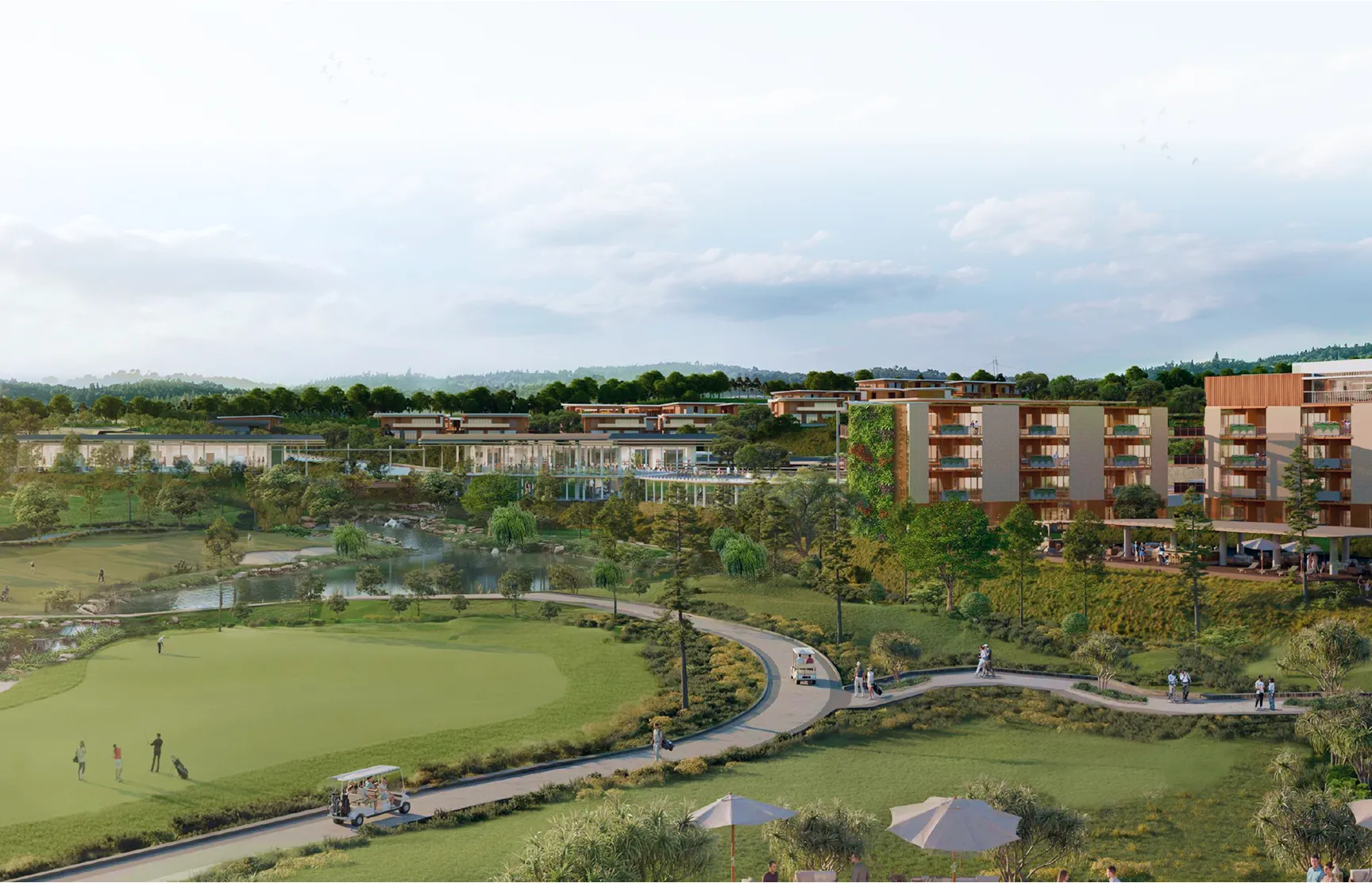 Aerial view of The Jembrana Estate: golf course, river and residences among Bali hills