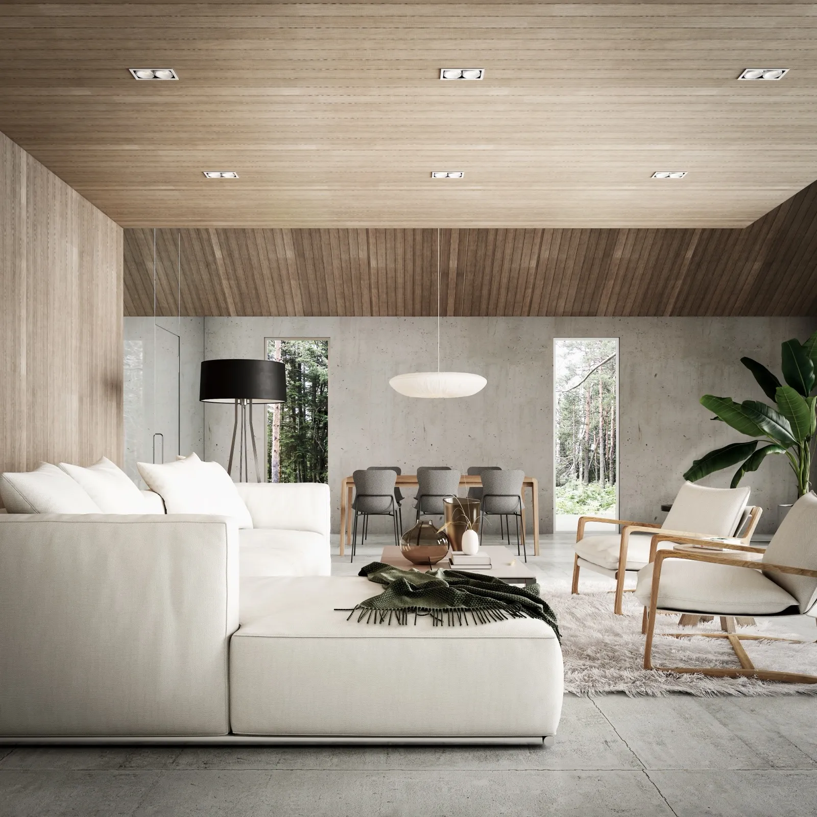 Living room with a white sectional sofa, timber ceiling and garden doors